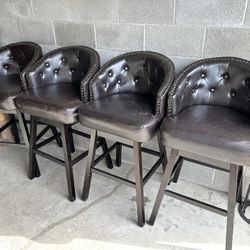 4 Tufted Swivel Bar Stools