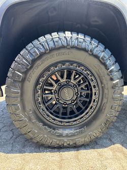 KMC KM557 Matte Black Gloss Black Lip 18x9 8x180 Offset 0 or +18 + Nitto Ridge Grappler 37x12.50R18 | Installed Bundle Deal