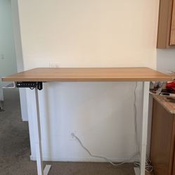 Motorized Sit/Stand Desk - 36” x 48” White Legs / Maple MDF Top
