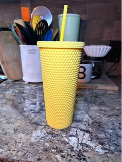 Cup with straw