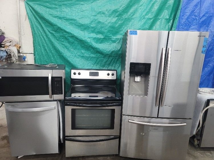 Stainless Steel Set Fridge Stove Dishwasher And Microwave All Good Working Conditions 