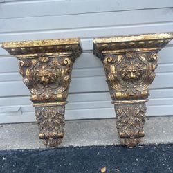 Two lion face Standing Columns , 20” high , 13 1/2 “ wide , 7 1/2 “ depth.   $150 for both