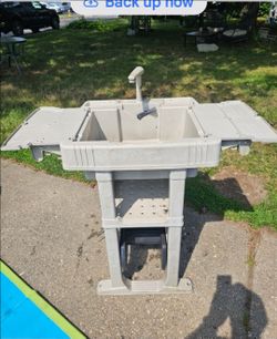 Price is firm.. backyard sink with hose reel