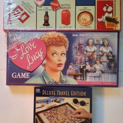 3 Board Games Coca-Cola Monopoly , I Love Lucy game and Scrabble Deluxe Travel Edition  $55