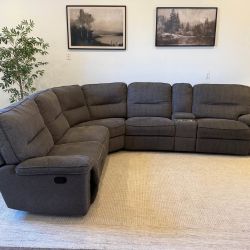 Gray manual recliner sectional couch delivery available