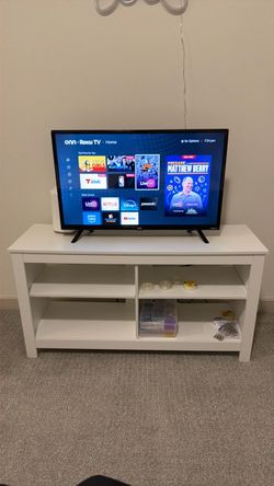 TV stand and 32” TV. Like new