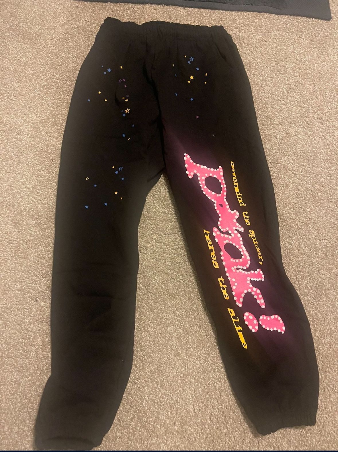 sp5der pink sweatpants black