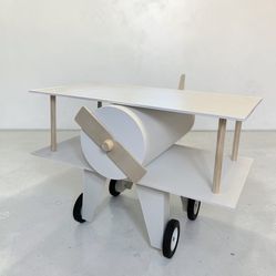 Ready for takeoff! Our custom airplane cart features a spinning front propeller and versatile shelving for desserts or décor.