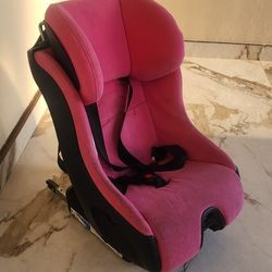 Clek Fllo Convertible Car Seat in the flamingo pink color.
