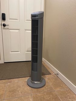Gray Tower Fan with Round Base