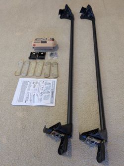 Yakima 48” roof rack round bar with Q towers.