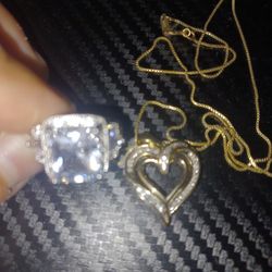 NICE BLING RING AND NECKLACE  SIZE 8