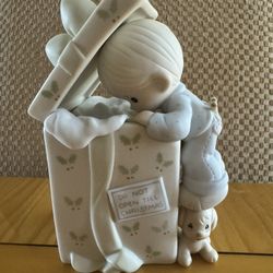 Precious Moments “Do Not Open Till Christmas” Figurine