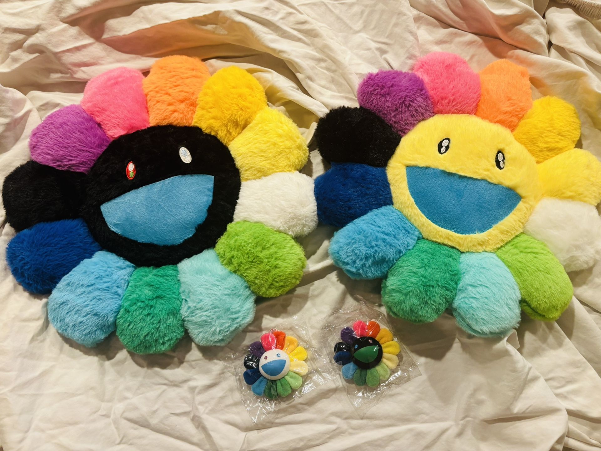 Takashi Murakami Rainbow Flower Bundle Set! 2 brand new rainbow 🌈 flower plush pillows. And 2 brand new with tags KaiKai Kiki co flower keychain pins