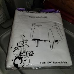 three white new table cloths