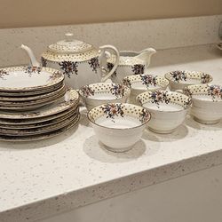 TEAPOT, SAUCERS, TEA CUPS, PLATES, CREAMER