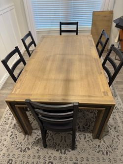 Living Spaces Design Evolution Dining Table and IKEA Chairs