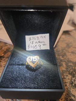 Make her Quinceañera unforgettable with this breathtaking solid 14K yellow gold "15" ring. This piece features a modern heart design with a bold numbe