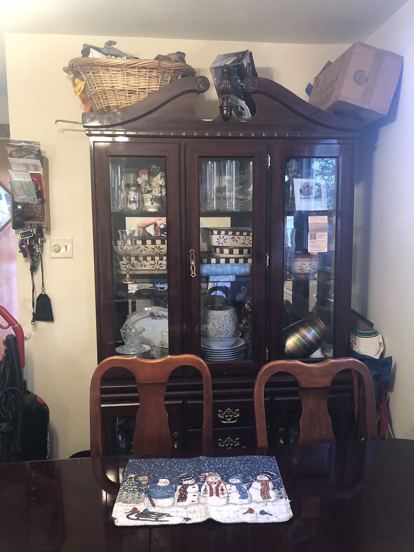 Dining room table and chairs with buffet and china closet