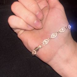 Givinchey gold plated quartz bracelet