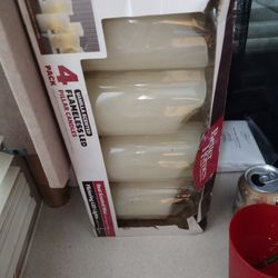 3 Boxes Of 4 L.E.D. Candles- Vanilla Scented