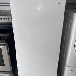 White GE Standing Freezer