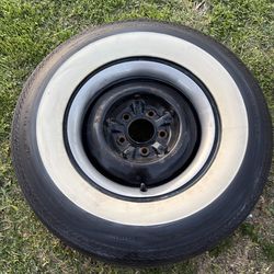 White wall tire and Chevy rime