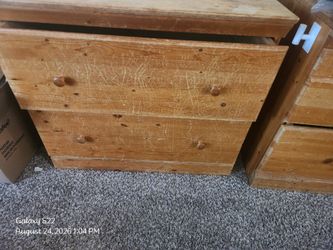 3 light wooded dressers