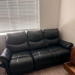 Dark Blue Leather Sofa….