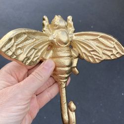Gold cast iron bee hook 