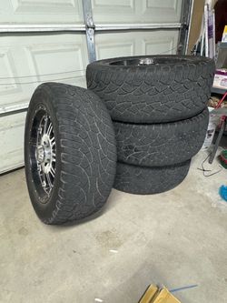 Set of 4 Tires on Chrome Wheels