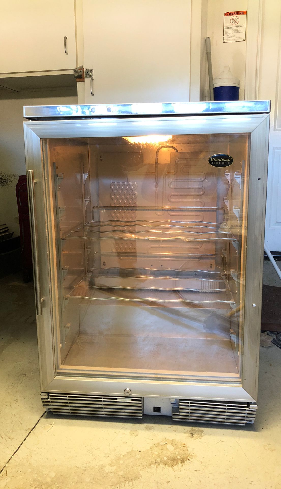 Vinotemp wine Refridgerator works great cost 1600.00 new selling it for 200.00