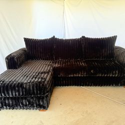 96 inch sofa with reversable chaise new