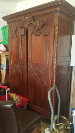 Armoire, bar, tv or clothing cabinet.