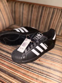 Adidas shell toe shoes