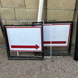 Three metal realtor / garage sale signs