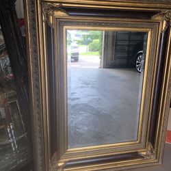 Gold framed mirror