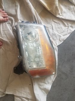 Nissan titan headlight drivers side only