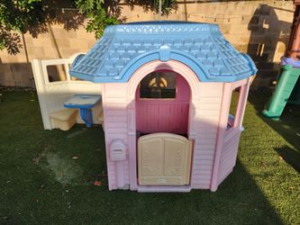 This is a Little Tikes Victorian Cottage playhouse