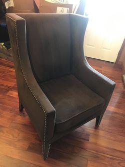 Highback chair with some cat scratches