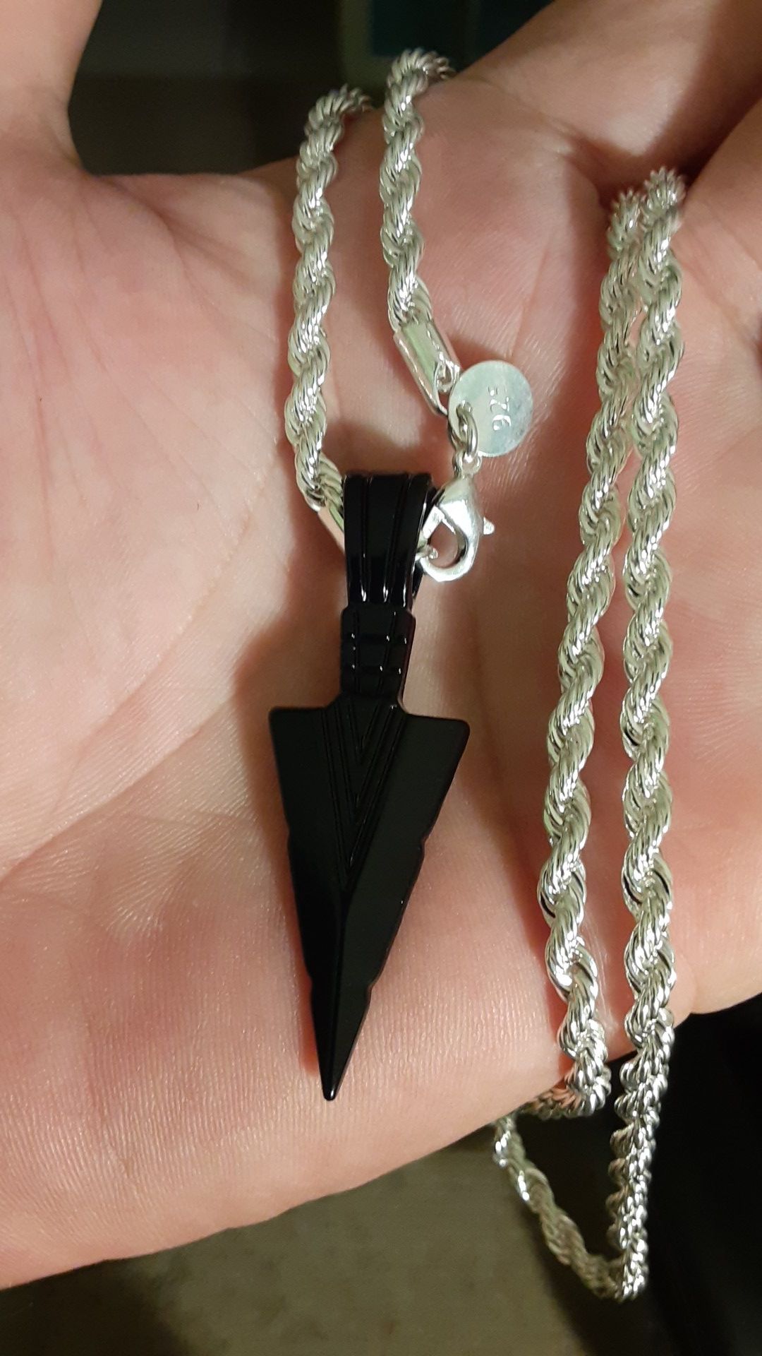 Sterling silver rope necklace with black arrowhead pendant