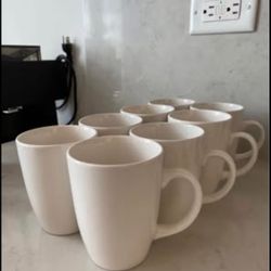 Set of 8 white ceramic mugs
