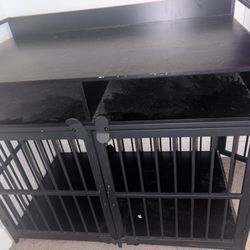 Used Black Metal Dog Crate With A In Built Un Table Top