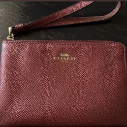 Coach burgundy wristlet