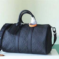 Sleek Louis Vuitton Keepall Bag