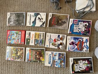 Wii game discs, console, Rock Band, Just Dance