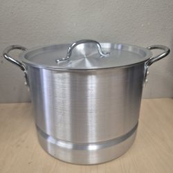 IMUSA aluminum steamer, commonly used for cooking tamales, seafood, or large batches of food. 
