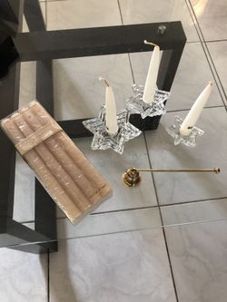 Stars table decoration with 8 - 10” candles, 3 - 6” candles and Chatham Snuffer. $10