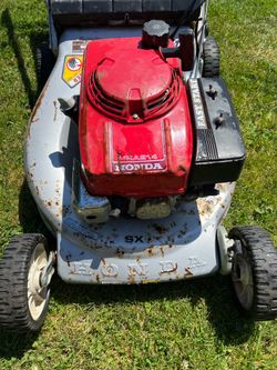 Honda HRA214 SX powered walk behind mower