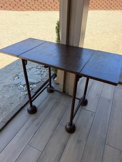 Beautiful Antique Rolling Folding Table.